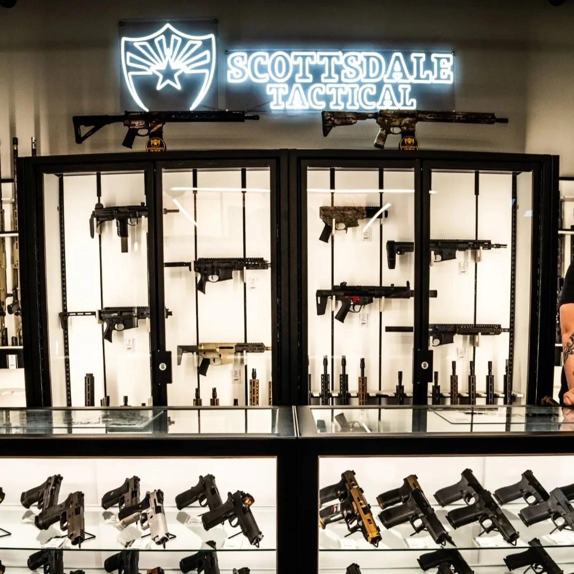 Scottsdale Tactical showroom with neon sign