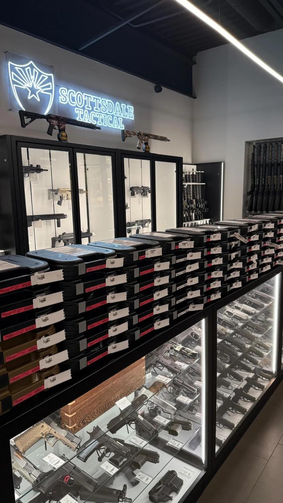 pistols stacked along counter
